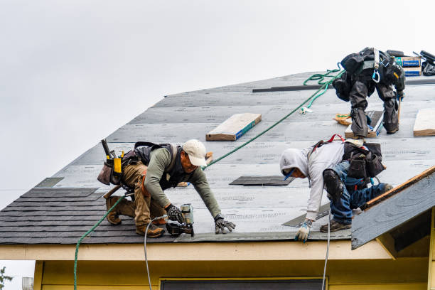 Professional Roofing technician working in Harmony, RI